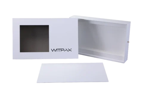 A white, rectangular rigid box featuring a clear window. The box is partially open, with its lid removed and placed in front.