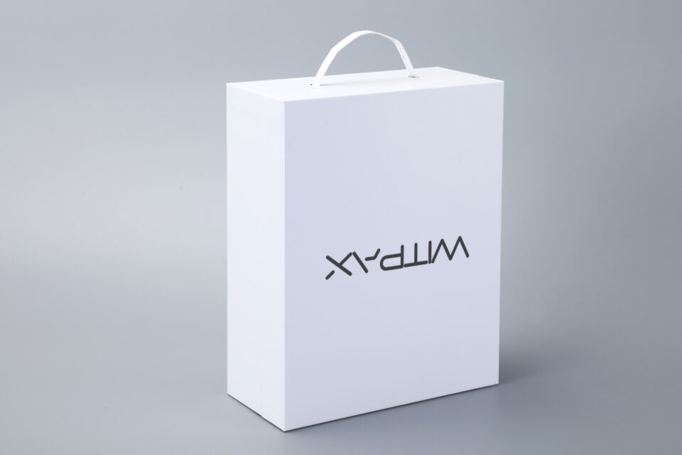 Portable hinged-lid shoulder box
