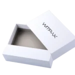 A white rectangular rigid box with a partially opened lid, The interior is unoccupied and features a light gray lining.