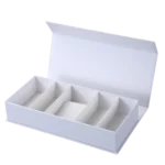 a white rectangular rigid box featuring four equal compartments and an open lid, designed for versatile packaging solutions.