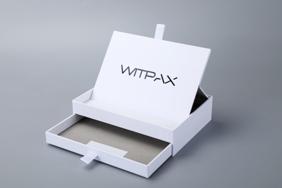 Flip-top box with drawer