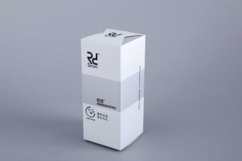 A custom-designed, tall rectangular box with a sleek white finish and branded elements, showcased against a neutral gray backdrop.