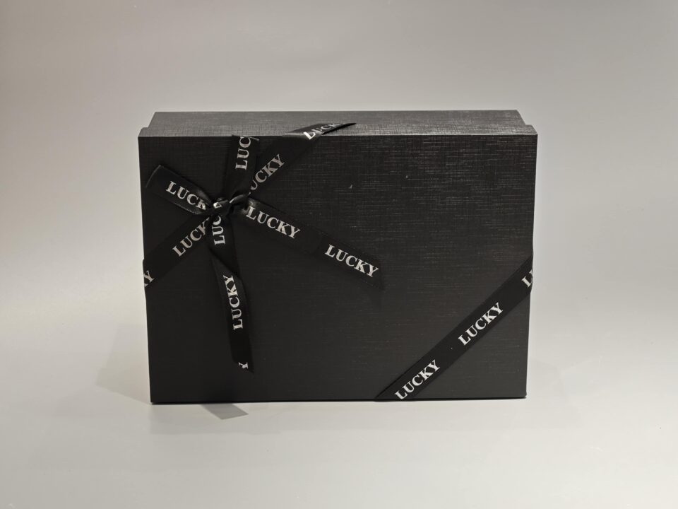 custom dark lift-off lid box with ribbon