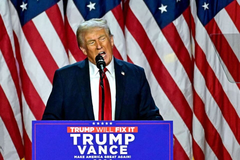 It illustrates Trump dressed in formal attire giving a presentation at a podium with an elegant backdrop featuring national symbols.