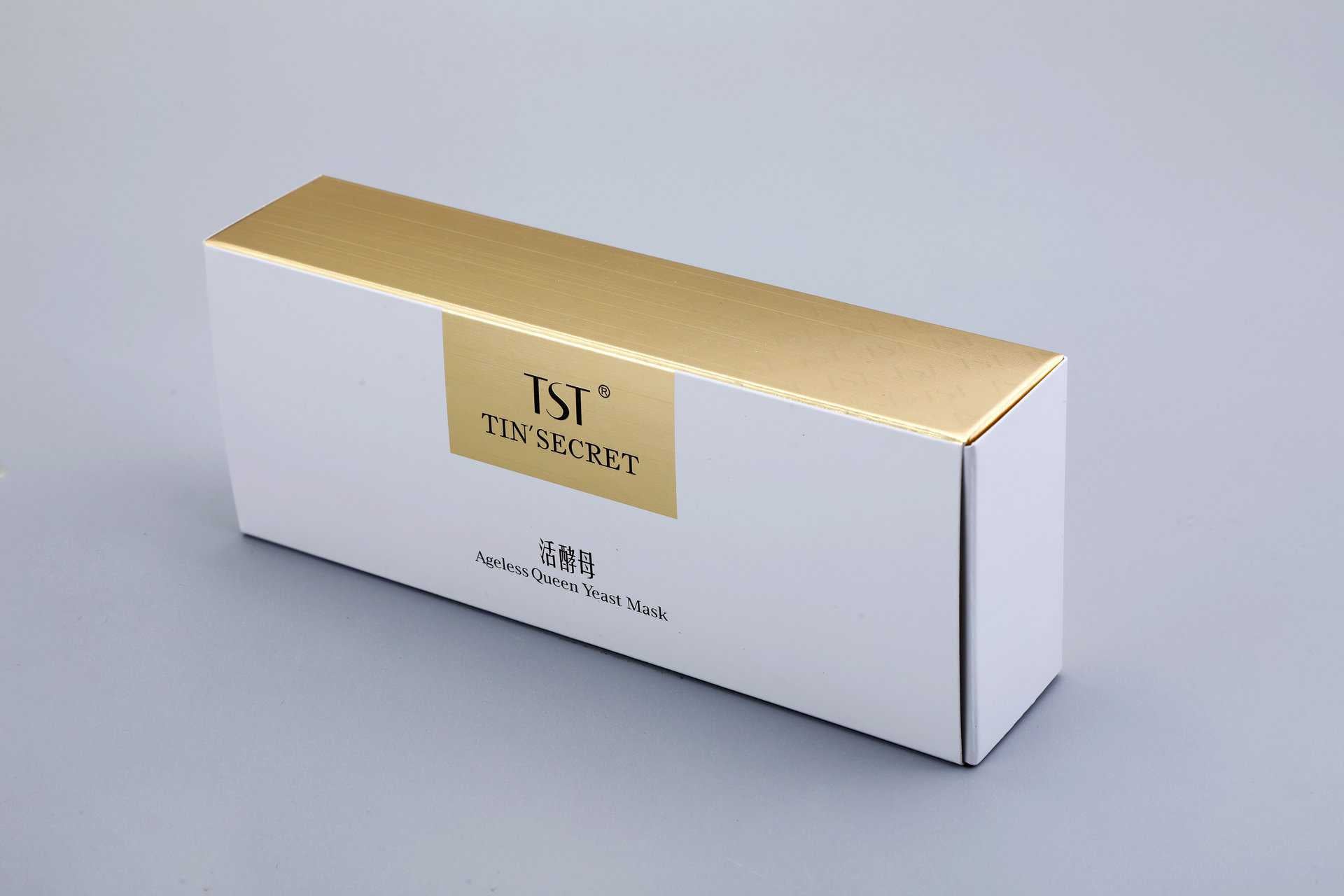 We are a manufacturer of custom box packaging. This product image shows a rectangular box featuring a premium design with gold and white elements, ideal for luxury beauty products such as skincare masks.